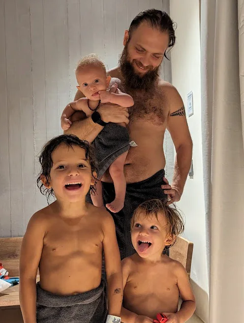 Boris with his three children before rebuilding his training rhythm
