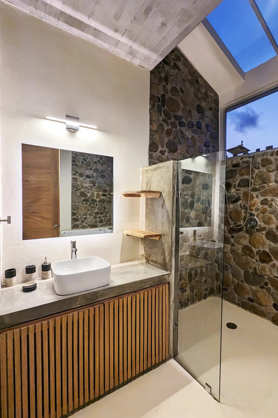 Villa washroom with stone shower